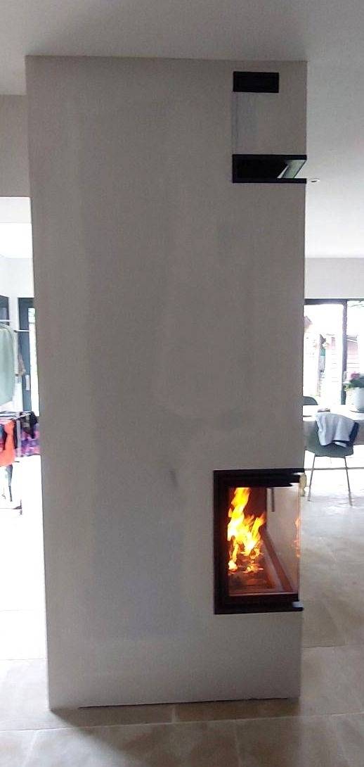 Créer une cheminée d'angle deux faces pour ma maison à Biscarrosse