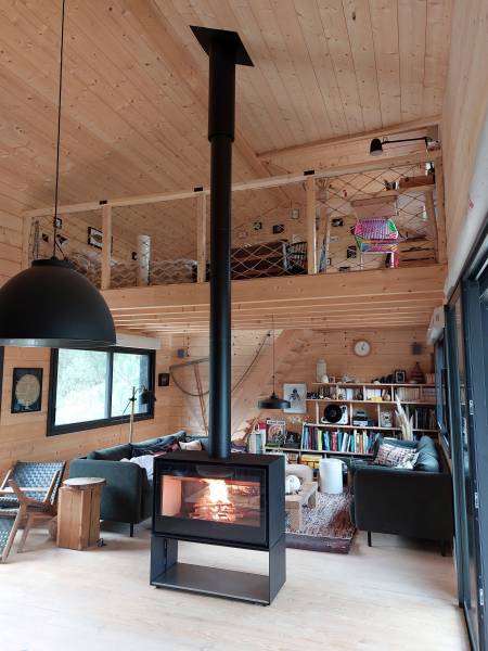Poêle à bois traversant avec rangement de bûches pour ma maison à Carcans